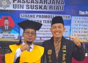 Ketua AGPAII Riau dan Ketua AGPAII Kampar Raih Gelar Doktor dengan Predikat Cumlaude