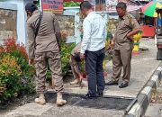 Demi Kententraman dan Ketertiban Umum, Satpol PP Kampar Pasang Papan Peringatan Dilarang Berjualan di Trotoar