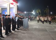 Bersama Pemda, Kapolres Kampar Pimpin Upacara Taptu Obor Kemerdekaan